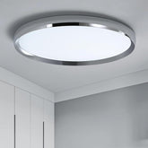 Ceiling light fixture in a room with white walls and cabinets